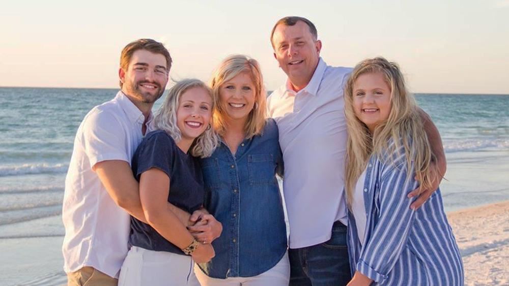 Dr. Lake and his family at the beach